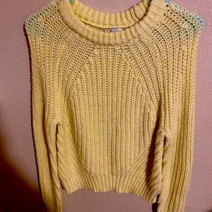 Pale yellow sweater